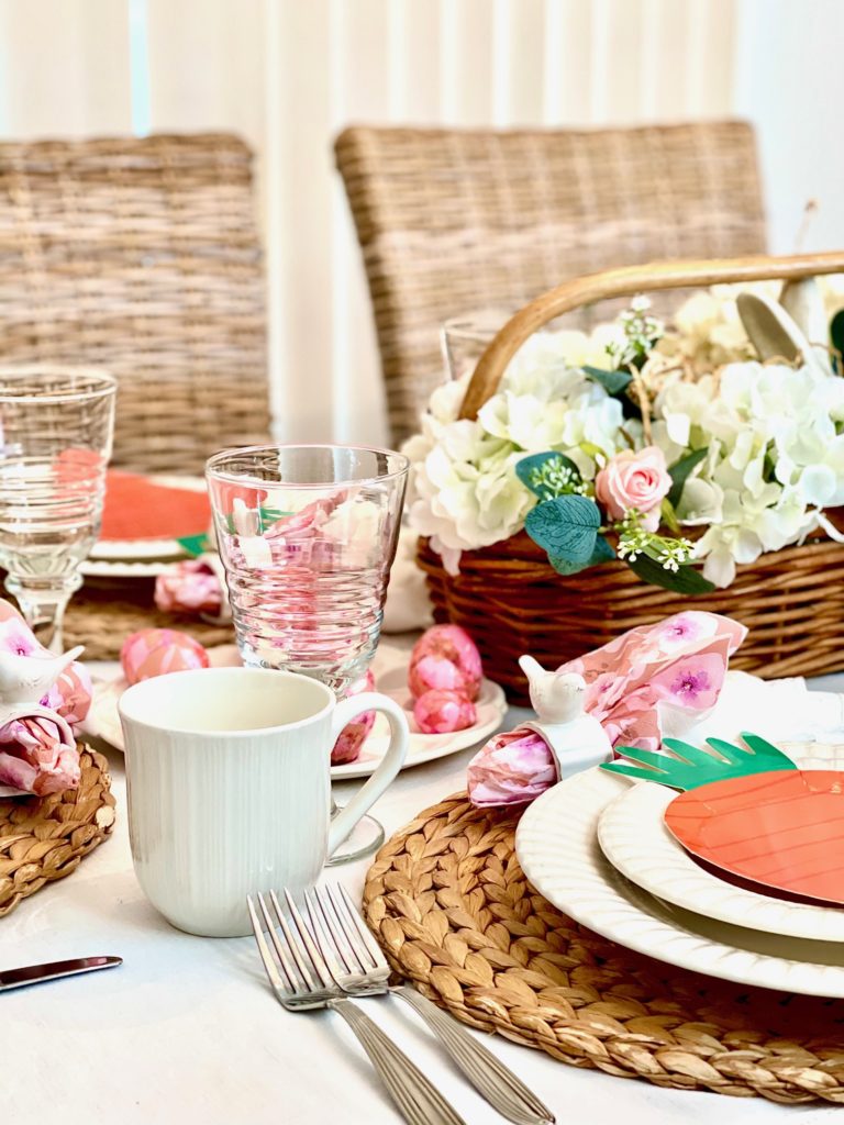 Easter table setting showing plates stem wear silverware