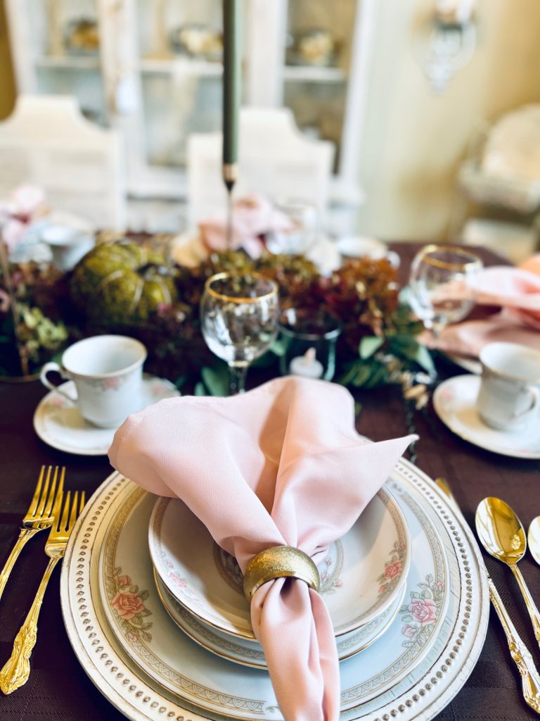 Use a cloth pink napkin for the budget fall table scape