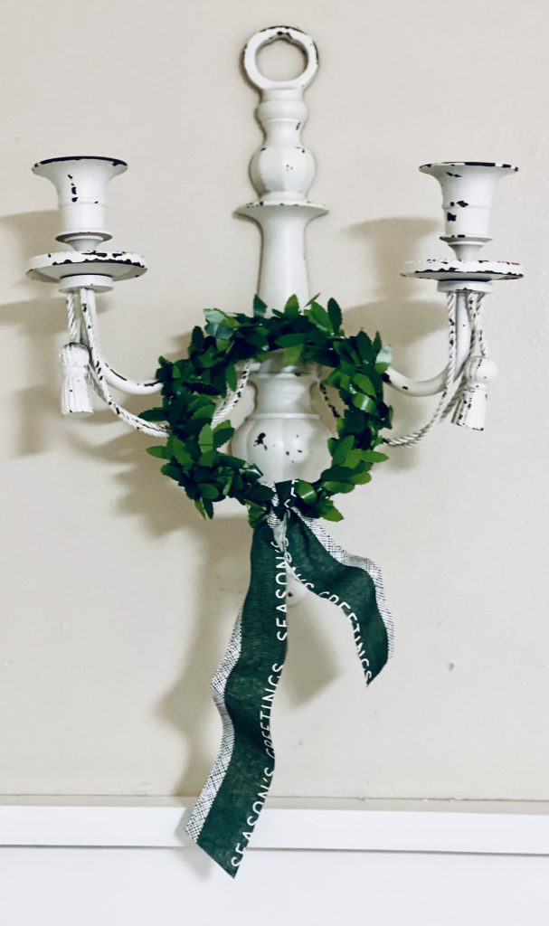 Sconce with wreath