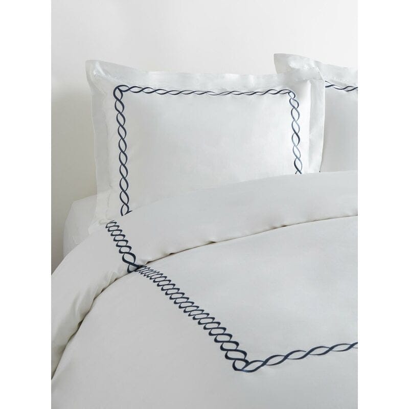 White spring bedding with blue trim