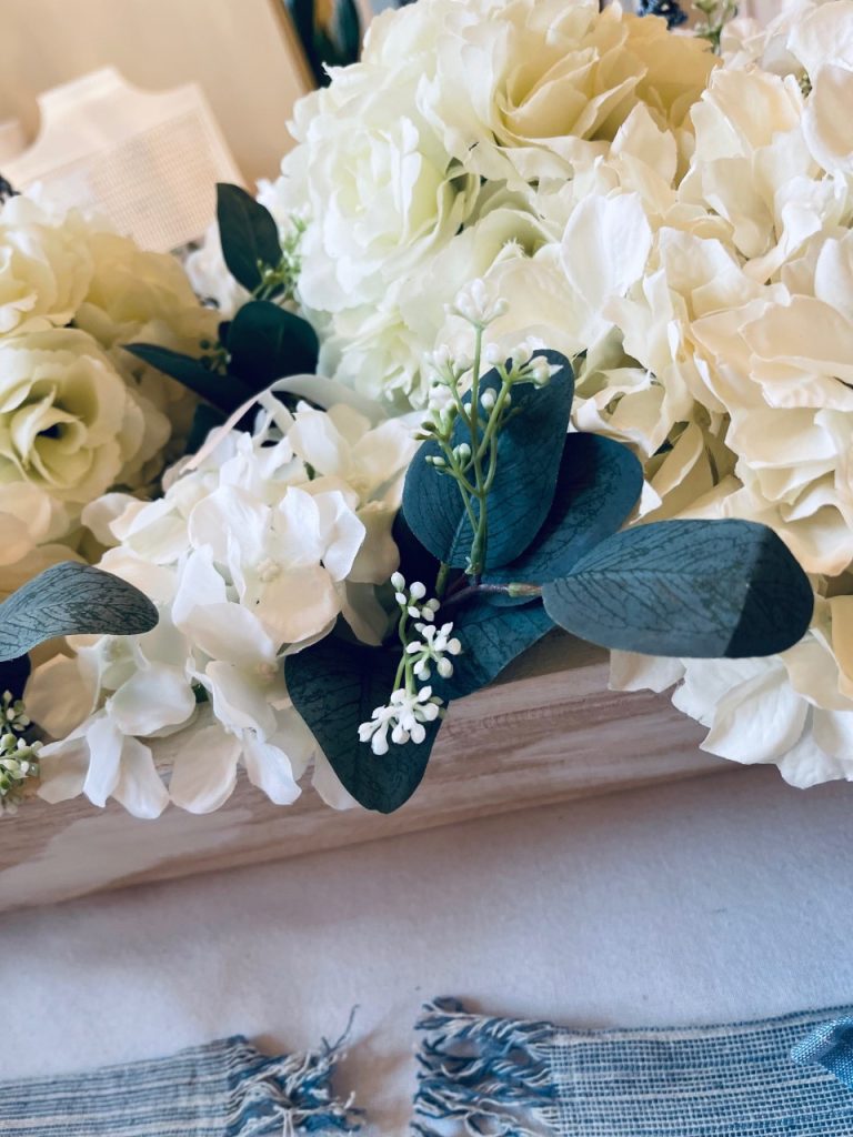 How to create a Spring Table Scape tissue paper for arraignment  by Adding flowers to the dough bowl