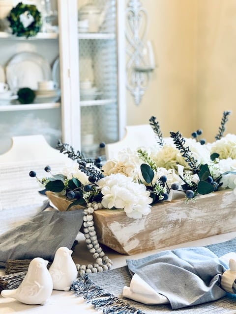 How to create a Spring Table Scape tissue paper for arraignment  by Adding flowers to the dough bowl Picture of birds