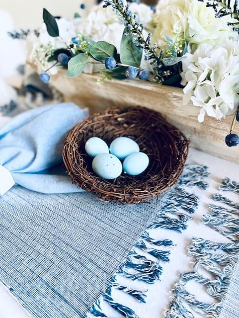 Blue easter eggs in a basket