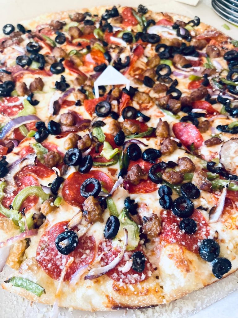 Meat and veggie pizza