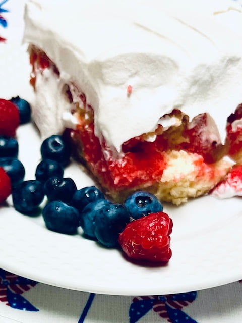 Picture of finished cake and berries