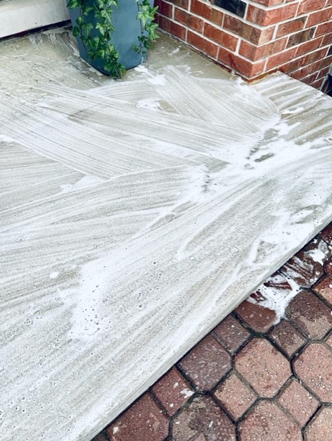 A picture of how I clean my small porch for fall decorating