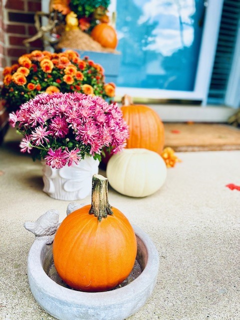 Pumpkins placed on the porch