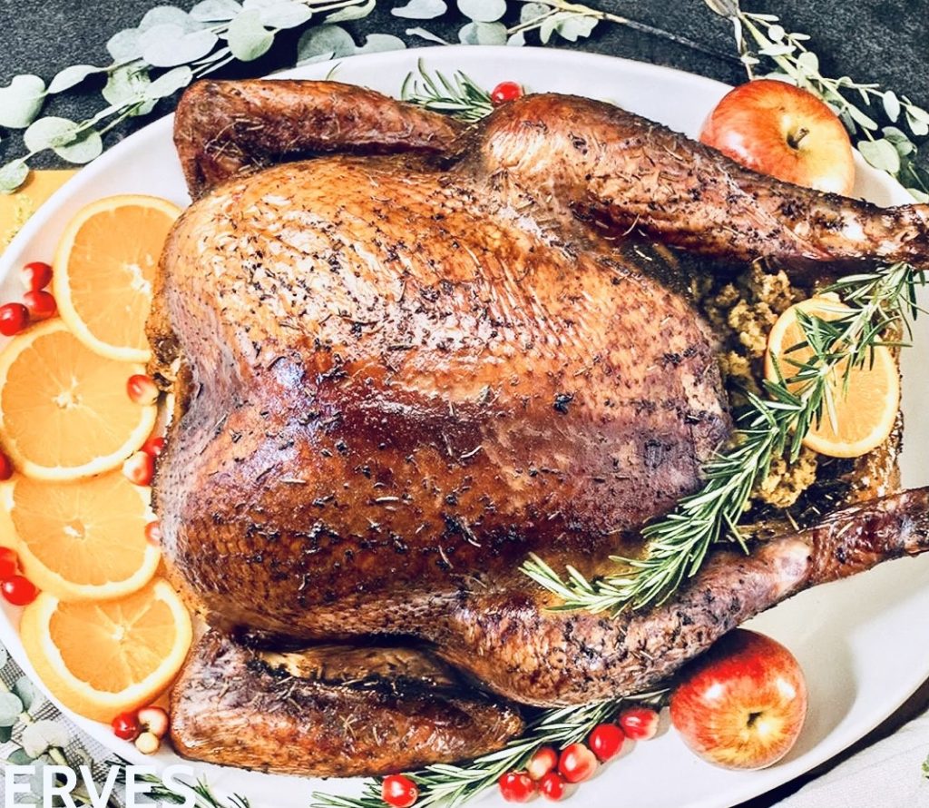 A turkey for thanksgiving dinner stuffed with fruit