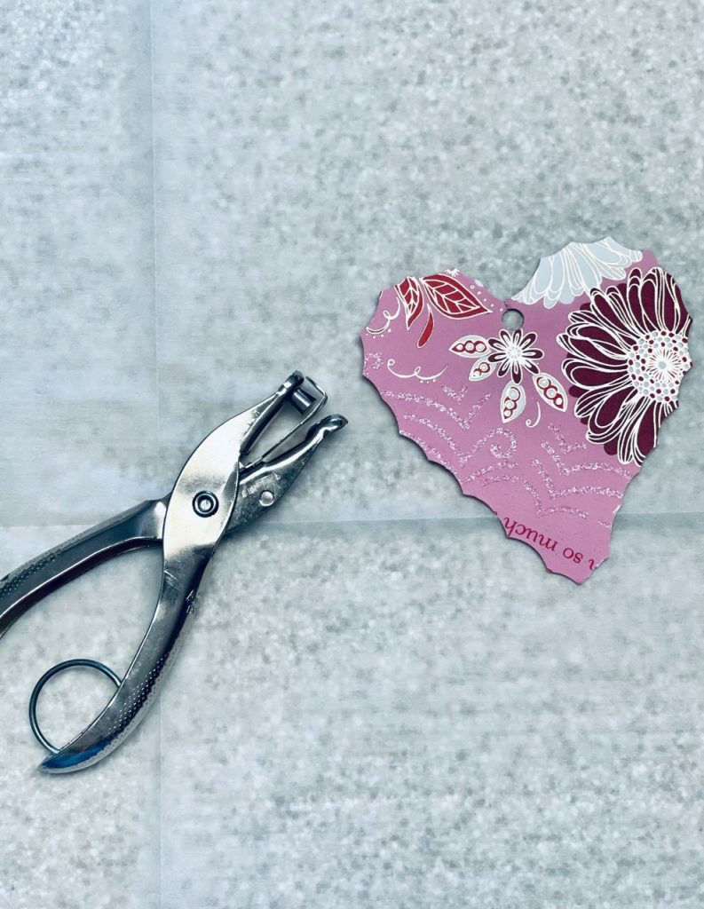 How to create the most special Valentine Garland, using a punch hole for the heart