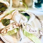 ribbon tied around napkins to create an Easter table scape