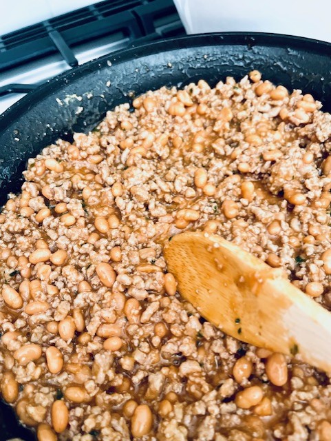 TAdding ketchup barbaque sauce mustard to The Best Gluten Free Sloppy Joe Recipehe mixture all made with 