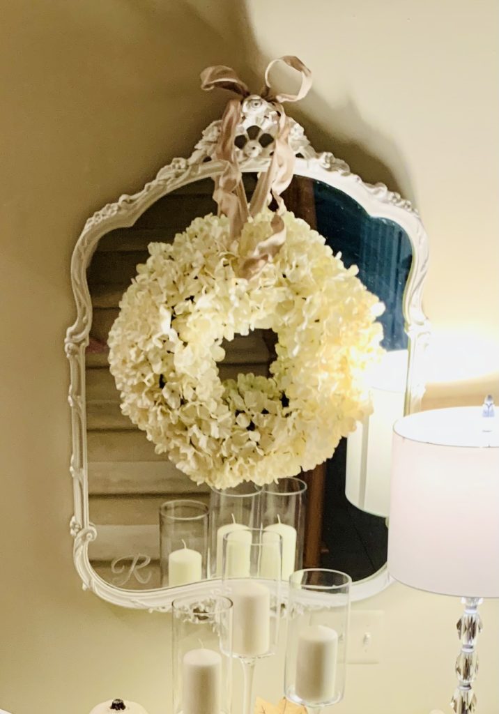 7 Inexpensive Fall Decorating Ideas with a wreath on a mirror